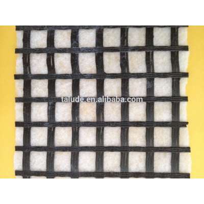 Geogrid composite geotextile fabric for road